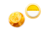 An open container of glacé orange