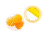 An open container of glacé pears