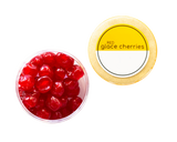 An open container of red glace cherries