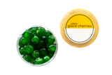An open container of green glacé cherries