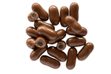 Bullets Milk Chocolate Coated in small scattered pile, some cut open to expose licorice centre.