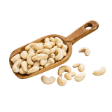 Rustic timber scoop filled with Raw Cashews. 