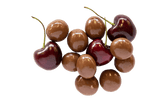 Small pile of Milk Chocolate Cherries with Red Cherries.