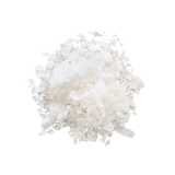 Small heaped pile of Coconut Flakes (Coconut Chips).