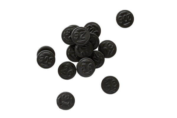 Small scattered pile of Dutch Licorice Coins.