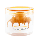 Side on view of Nut Market jar with Glace Figs inside.