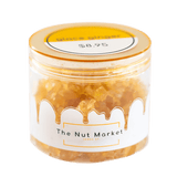 Side on view of Nut Market jar with Glace Ginger inside.