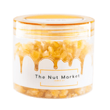 Side on view of Nut Market jar with Glace Mixed Peel inside.