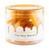 Side on view of Nut Market jar with Glace Oranges inside.