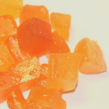 Close up of diced ginger in syrup. Australian Glace Ginger on white background.