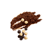 Smear of Chocolate Hazelnut Butter with scattered whole hazelnuts and chocolate chips.