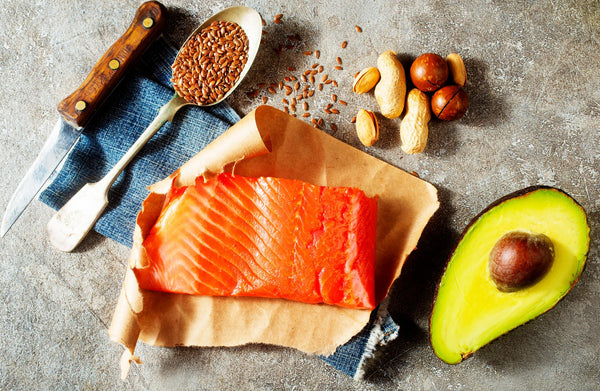 Sources of omega-3 including linseeds, salmon, avocado and nuts