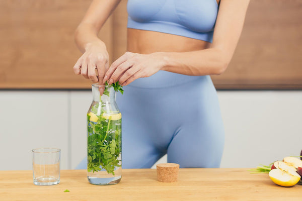 Woman planning a detox and making a green juice