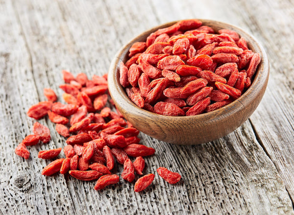 Bowl of goji berries on a table