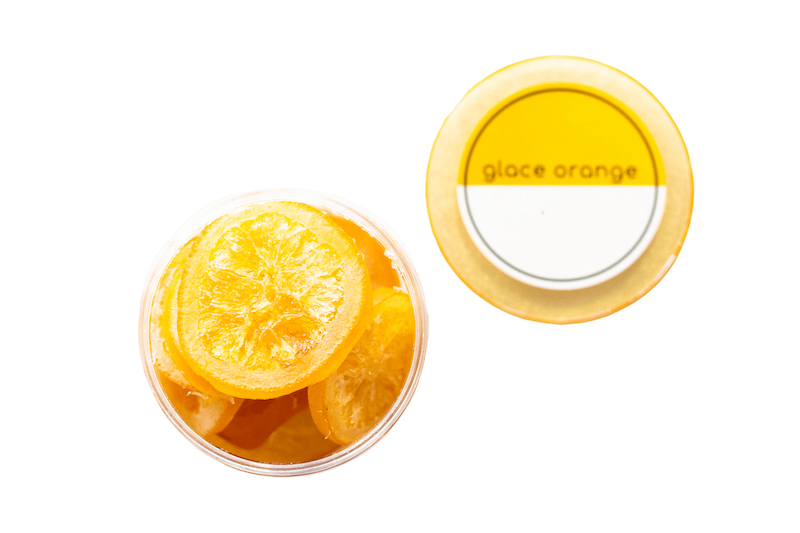 An open container of glacé orange