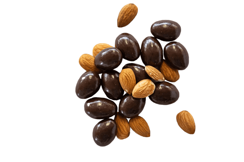 Dark Chocolate Almonds with raw almonds in small scattered pile. 
