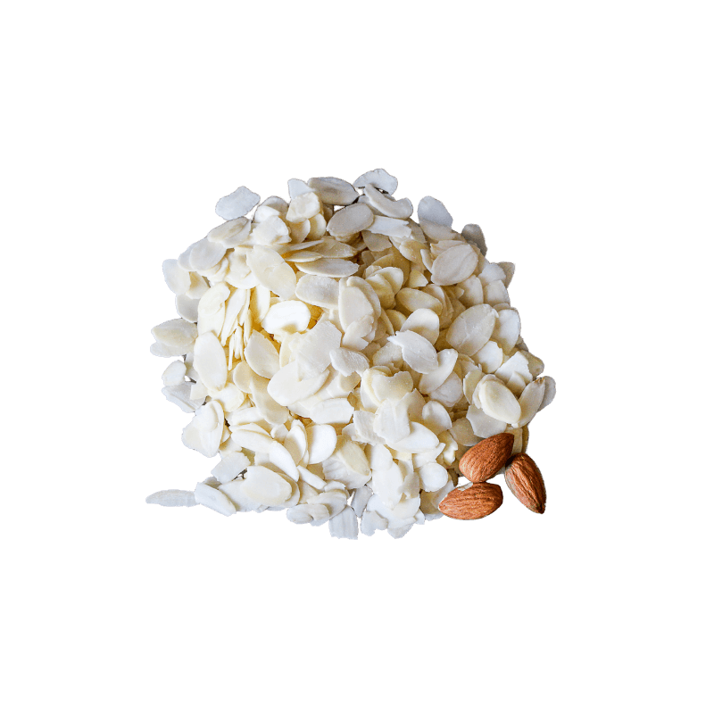 Neat pile of Blanched Almonds Flakes with three whole raw almonds. 