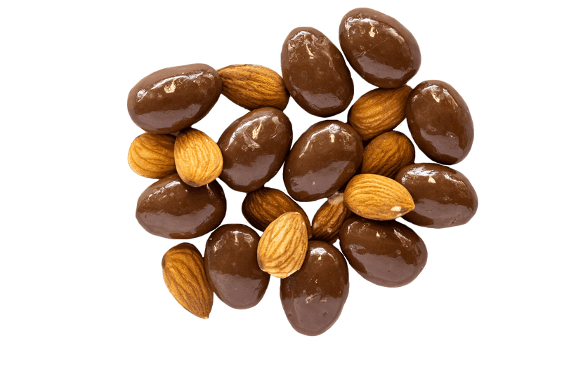 Handful of Milk Chocolate Almonds with raw almonds scattered between.