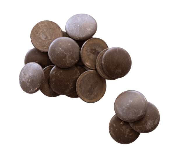 Small pile of Callebaut 73 % Vegan Dark Chocolate Callets.