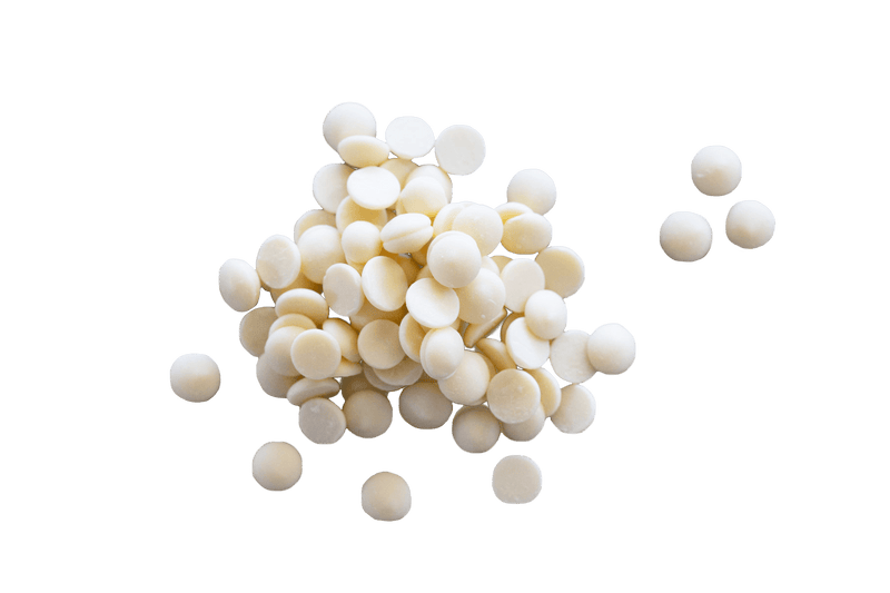 Small scattered pile of Callebaut White Chocolate Callets.
