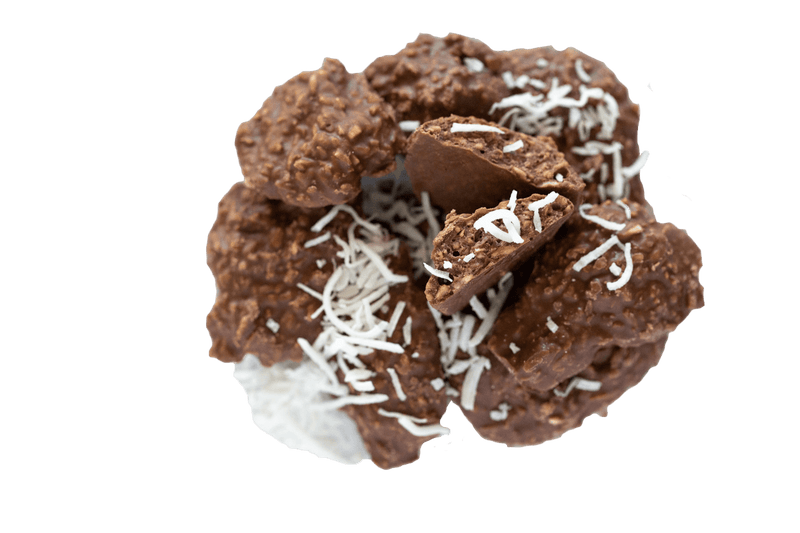 Small pile of Coconut Rough chocoalte bites dusted with shredded coconut.