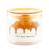 Side on view of Nut Market jar with Glace Figs inside.