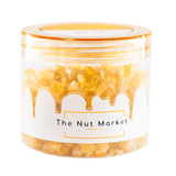 Side on view of Nut Market jar with Glace Mixed Peel inside.