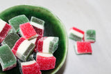 Close up of Jolly Jellies Christmas Lollies in small green bowl.