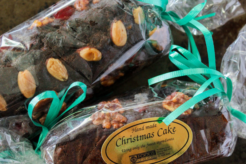 Close up of Gluten Free Christmas Cakes, with Almonds and Walnuts on top. 