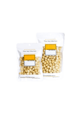 Macadamia Nuts Raw in 180g and 450g Nut Market bags. 