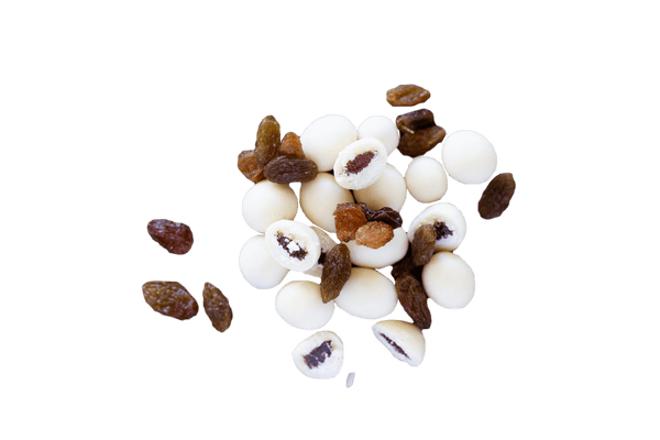 Cluster of Yoghurt Coated Sultanas with scattered sultanas.